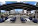 Community outdoor grilling station and seating area at 943 Peachtree Ne St # 1108, Atlanta, GA 30309
