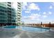 Beautiful community pool area with lounge chairs at 943 Peachtree Ne St # 1108, Atlanta, GA 30309