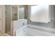 Bathroom featuring a bathtub and glass shower at 10166 Benton Woods Dr, Covington, GA 30014