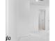 An unfinished, bright bedroom has crisp white walls and access to an adjoining room at 1420 Windance Lake Dr, Loganville, GA 30052