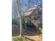 Backyard area showing the home's exterior and lush surroundings ready for your personal touch at 1483 Hardee Ne St, Atlanta, GA 30307