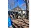 Image shows an outdoor space and overgrown backyard at 1483 Hardee Ne St, Atlanta, GA 30307