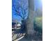 Home exterior with mature trees, and a street view at 1483 Hardee Ne St, Atlanta, GA 30307