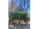 View of a home with lush green foliage offering privacy and charm at 1483 Hardee Ne St, Atlanta, GA 30307