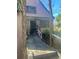 Charming home entrance featuring a black-trimmed, decorative lattice, and well-maintained steps at 1483 Hardee Ne St, Atlanta, GA 30307
