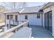View of the back deck with a gray surface, white siding, and sliding glass doors at 3465 Callie Still Rd, Lawrenceville, GA 30045