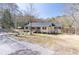 Inviting home with fresh landscaping and a welcoming front porch, creating a warm and appealing curb presence at 3465 Callie Still Rd, Lawrenceville, GA 30045