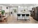 A well-equipped kitchen featuring a kitchen island, stainless steel appliances, and plenty of space at 3465 Callie Still Rd, Lawrenceville, GA 30045