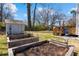 A spacious backyard showcases garden beds and a play structure, enhancing outdoor enjoyment at 1060 Mclinden Se Ave, Smyrna, GA 30080