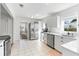 Bright kitchen with stainless steel appliances and an open layout at 1060 Mclinden Se Ave, Smyrna, GA 30080