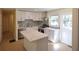 Bright, updated kitchen features stainless steel appliances and quartz countertops at 2422 Clarissa Nw Dr, Atlanta, GA 30318
