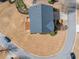 Overhead aerial shot of the home, showing the roof and landscaping, and surrounding streets and neighborhood at 4790 Maristone Landing Way, Cumming, GA 30040