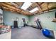 Spacious basement area with gym equipment, offering potential for various uses at 4790 Maristone Landing Way, Cumming, GA 30040