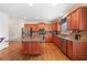 Bright kitchen featuring a center island, stainless steel appliances, and granite countertops at 4790 Maristone Landing Way, Cumming, GA 30040