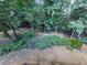 Private, wooded backyard with mature trees and natural landscaping, creating a serene and secluded outdoor space at 1012 Jubilee Way, Powder Springs, GA 30127