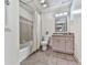 Bathroom with a bathtub-shower combination and a tiled floor at 1012 Jubilee Way, Powder Springs, GA 30127