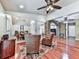 Dining room with wood floors and chairs situated between other rooms at 1012 Jubilee Way, Powder Springs, GA 30127