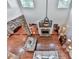 Stylish living room featuring hardwood floors, stone fireplace, skylights, and elegant contemporary decor at 1012 Jubilee Way, Powder Springs, GA 30127