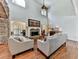 Bright living room with high ceilings, stone fireplace and large windows at 1012 Jubilee Way, Powder Springs, GA 30127