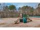 Community playground with swings and slide, perfect for outdoor activities at 1042 Wildwood Wake Bnd, Dacula, GA 30019