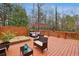 Outdoor deck with hot tub and furniture nestled within a fenced backyard at 2795 Kakki Ct, Marietta, GA 30062