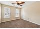 Bedroom with carpet, two windows and ceiling fan at 2795 Kakki Ct, Marietta, GA 30062