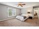 Bedroom with carpet, a ceiling fan, and view to a hall at 2795 Kakki Ct, Marietta, GA 30062