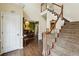 Inviting entryway features hardwood floors, staircase, and view into the formal dining room at 2795 Kakki Ct, Marietta, GA 30062