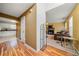 Inviting foyer with hardwood floors, staircase, and glimpses of the living room and kitchen at 3999 Craggy Perch, Douglasville, GA 30135