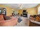 Cozy living room featuring a fireplace, comfortable seating, and an open layout for entertaining at 3999 Craggy Perch, Douglasville, GA 30135