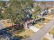 Aerial view of a home with mature trees, driveway, and street access at 715 Wallington Way, Lawrenceville, GA 30046