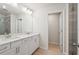 Bright bathroom with double vanity, quartz countertop, and spacious tile shower at 1024 Rose Dr, Marietta, GA 30060