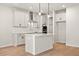 Modern kitchen with sleek countertops, stainless steel appliances, a central island, and stylish pendant lighting at 1024 Rose Dr, Marietta, GA 30060