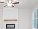 Living room with white shiplap fireplace and dark wood mantle at 1024 Rose Dr, Marietta, GA 30060