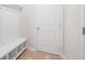 Mudroom with storage bench and white trim work at 1024 Rose Dr, Marietta, GA 30060