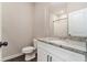 Modern bathroom with granite countertops, white cabinets, and sleek fixtures for a clean aesthetic at 1508 Burberry Aly, Marietta, GA 30008