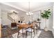 Open dining area with hardwood floors and decorative lighting at 1508 Burberry Aly, Marietta, GA 30008