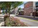 Street view of commercial district with restaurants, trees, and manicured landscaping at 1508 Burberry Aly, Marietta, GA 30008