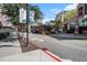 Street view of an attractive commercial district, with sidewalks, trees, businesses and directional road markings at 1508 Burberry Aly, Marietta, GA 30008