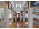 Elegant foyer with hardwood floors, high ceilings, chandelier, and access to other rooms at 2986 Nestle Creek Dr, Marietta, GA 30062