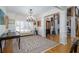 Bright living room with hardwood floors, chandelier, natural light, and view of front entryway at 2986 Nestle Creek Dr, Marietta, GA 30062