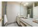 Bright bathroom featuring a large vanity area and tiled shower at 388 Beverly Ne Rd, Atlanta, GA 30309