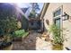 Charming courtyard with stone flooring, lush greenery, and comfortable seating area perfect for relaxing at 388 Beverly Ne Rd, Atlanta, GA 30309