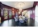 A formal dining area featuring a round table with seating for eight and a view to the outdoor terrace at 388 Beverly Ne Rd, Atlanta, GA 30309