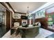 Elegant living room featuring hardwood floors, a fireplace, and custom millwork at 388 Beverly Ne Rd, Atlanta, GA 30309