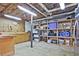 Basement area featuring shelving, storage, work bench and concrete floor at 1590 Greyson Rdg, Marietta, GA 30062