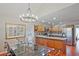 Dining area and kitchen featuring stainless steel appliances and wooden cabinetry at 1590 Greyson Rdg, Marietta, GA 30062