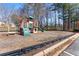 Neighborhood playground providing a fun and safe recreational area for children to play at 3595 Ansley Park Dr, Suwanee, GA 30024