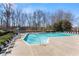 A spacious outdoor swimming pool offers a refreshing amenity for residents' enjoyment at 3595 Ansley Park Dr, Suwanee, GA 30024