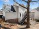 Back exterior of home with deck and stairs at 3595 Ansley Park Dr, Suwanee, GA 30024